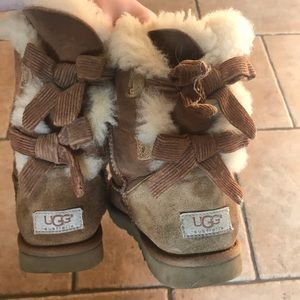 Very worn and used ugg boots.